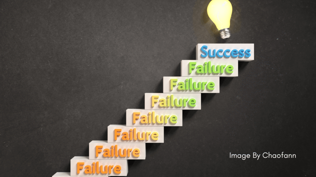 Colorful steps with the word "failure" on them.