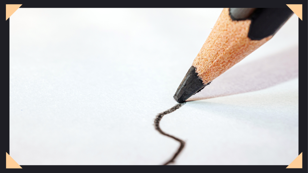 Image with a pencil stroke across a piece of paper