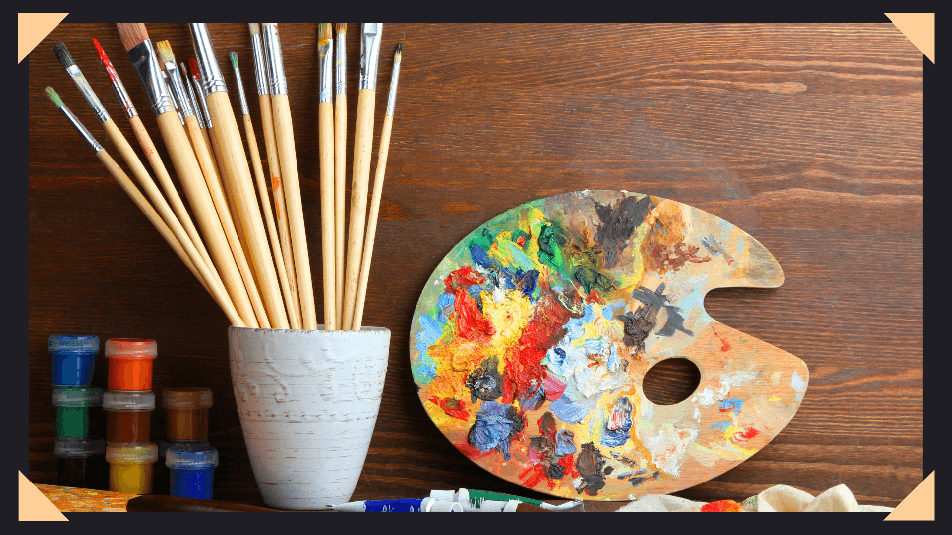 Paint palette with multiple paints and brushes